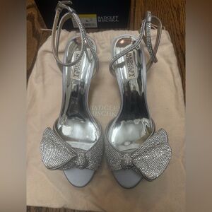 Brand new, never worn Badgley Mischka Remi Glittering Silver Heels.